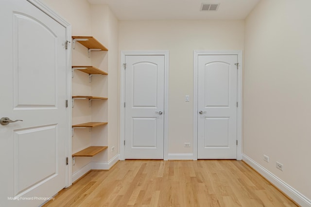3129 N Oconto Ave, Chicago, IL 60707 - unfurnished bedroom featuring light wood finished floors