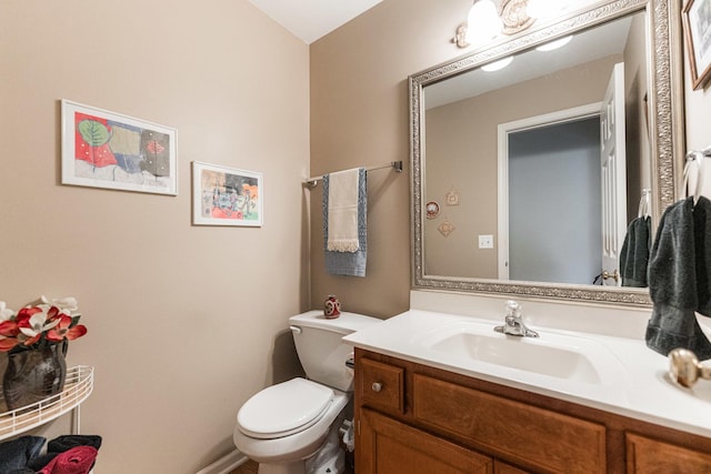 102 Quinlan Ave, Dekalb, IL 60115 - half bathroom with vanity and toilet