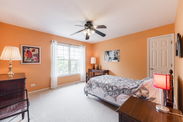 102 Quinlan Ave, Dekalb, IL 60115 - carpeted bedroom featuring baseboards and a ceiling fan