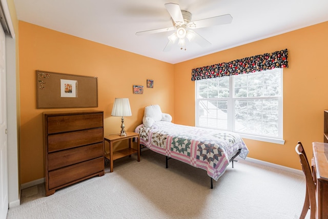 102 Quinlan Ave, Dekalb, IL 60115 - carpeted bedroom featuring baseboards and a ceiling fan