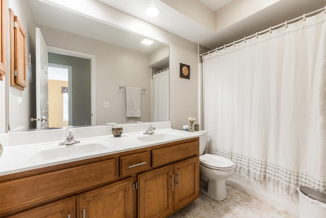 102 Quinlan Ave, Dekalb, IL 60115 - bathroom featuring double vanity, a shower with shower curtain, recessed lighting, and tile patterned floors