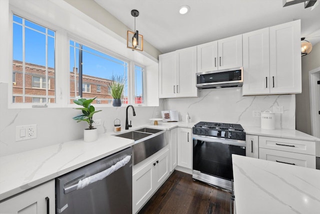 2101 S 48th Ct, Cicero, IL 60804 - kitchen featuring stainless steel appliances, dark wood-type flooring, white cabinetry, tasteful backsplash, and recessed lighting