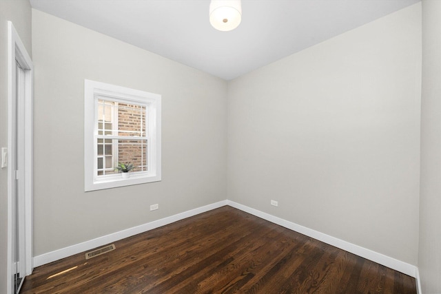 2101 S 48th Ct, Cicero, IL 60804 - empty room featuring baseboards and dark wood-style floors