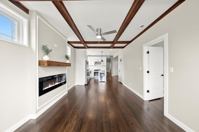 2101 S 48th Ct, Cicero, IL 60804 - unfurnished living room featuring a ceiling fan, dark wood-style flooring, a glass covered fireplace, beam ceiling, and coffered ceiling