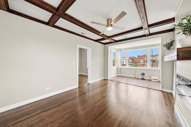 2101 S 48th Ct, Cicero, IL 60804 - unfurnished living room featuring coffered ceiling, a ceiling fan, wood finished floors, and beamed ceiling