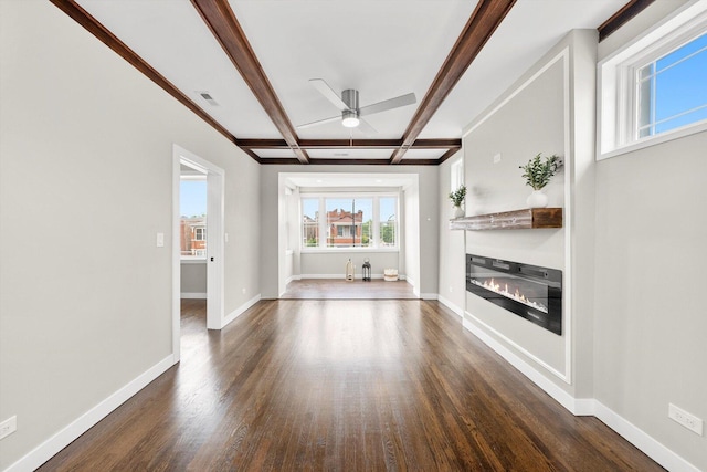 2101 S 48th Ct, Cicero, IL 60804 - unfurnished living room with dark wood-style floors, a ceiling fan, coffered ceiling, a glass covered fireplace, and beam ceiling