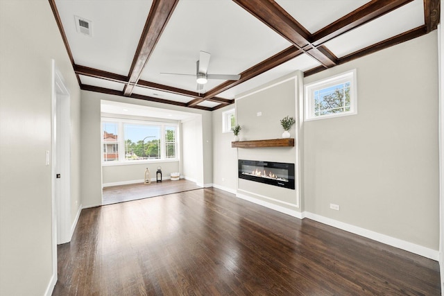 2101 S 48th Ct, Cicero, IL 60804 - unfurnished living room with coffered ceiling, plenty of natural light, wood finished floors, a ceiling fan, and a glass covered fireplace