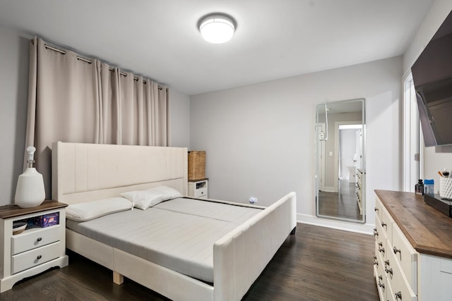 1017 Dell Rd, Northbrook, IL 60062 - bedroom featuring dark wood finished floors and baseboards