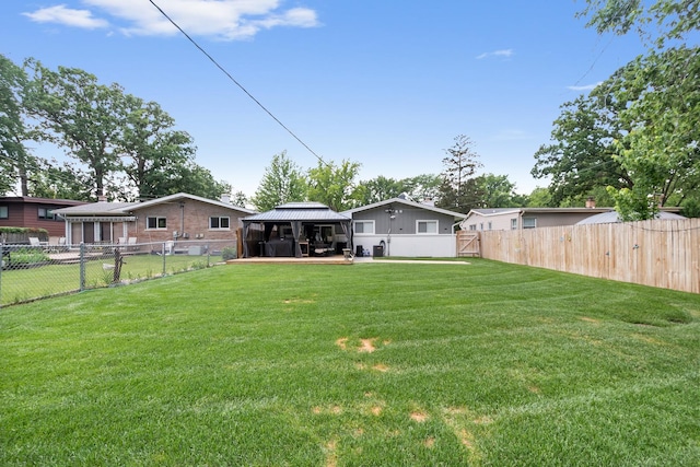 1017 Dell Rd, Northbrook, IL 60062 - fenced backyard featuring a gazebo