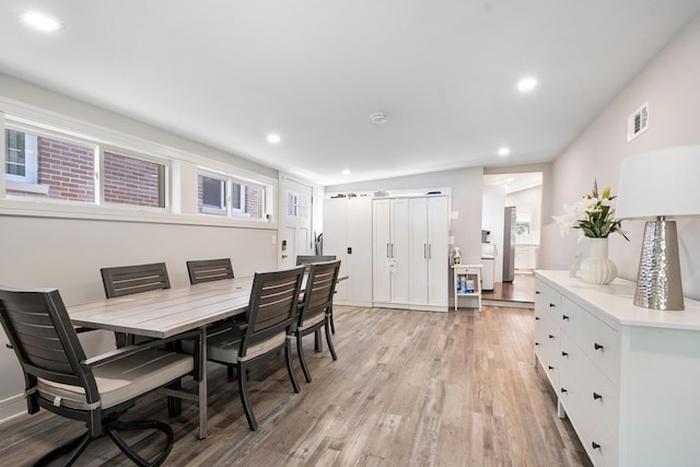 1017 Dell Rd, Northbrook, IL 60062 - dining room featuring light wood-style flooring and recessed lighting