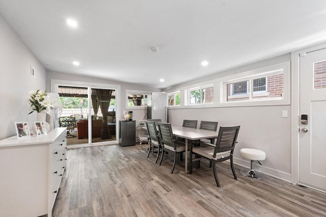 1017 Dell Rd, Northbrook, IL 60062 - dining area with light wood-style flooring and recessed lighting