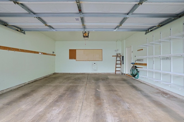12243 Quail Ridge Dr, Huntley, IL 60142 - garage featuring a garage door opener