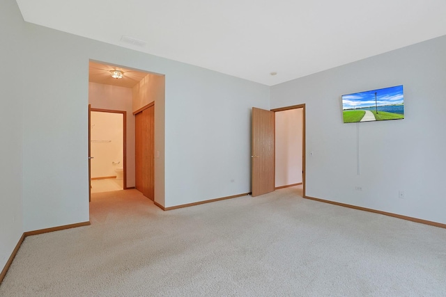 12243 Quail Ridge Dr, Huntley, IL 60142 - unfurnished bedroom featuring light carpet and ensuite bathroom