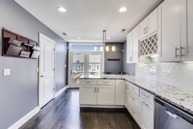5921 N Navarre Ave, Chicago, IL 60631 - kitchen featuring dishwasher, a peninsula, white cabinets, dark wood-style flooring, and recessed lighting