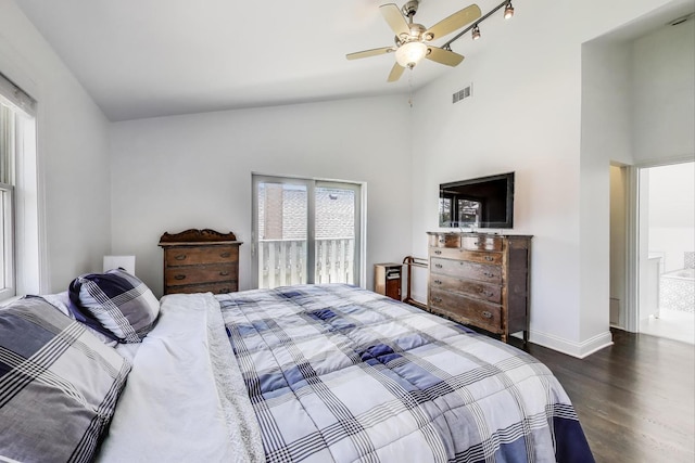 5921 N Navarre Ave, Chicago, IL 60631 - bedroom with multiple windows, wood finished floors, ceiling fan, and high vaulted ceiling