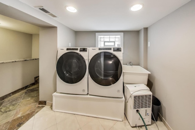 5921 N Navarre Ave, Chicago, IL 60631 - washroom with washing machine and clothes dryer and recessed lighting