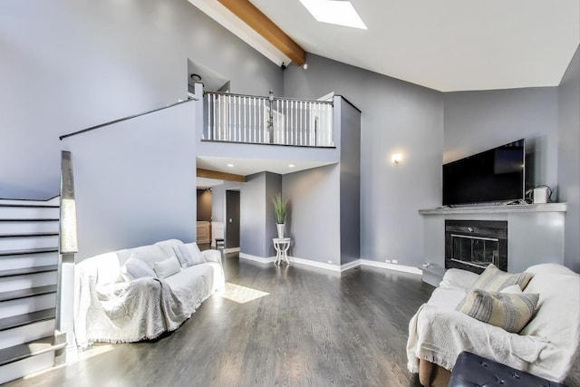 5921 N Navarre Ave, Chicago, IL 60631 - living room with beamed ceiling, wood finished floors, high vaulted ceiling, a glass covered fireplace, and a skylight