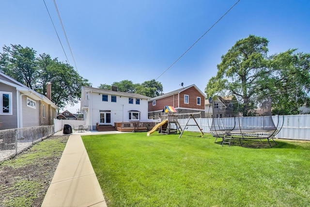 5921 N Navarre Ave, Chicago, IL 60631 - fenced backyard featuring a playground and a trampoline