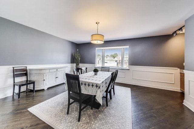 5921 N Navarre Ave, Chicago, IL 60631 - dining space featuring a wainscoted wall, dark wood-style floors, and a decorative wall