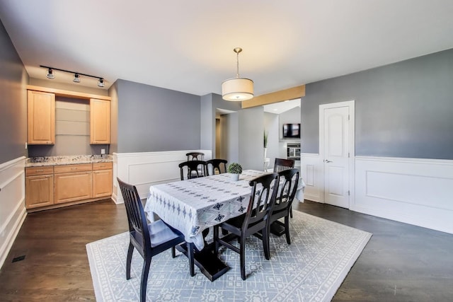 5921 N Navarre Ave, Chicago, IL 60631 - dining room with a decorative wall, wainscoting, and rail lighting