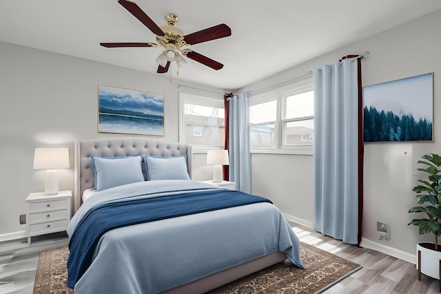 8821 N Washington St Unit F, Niles, IL 60714 - bedroom featuring wood finished floors and a ceiling fan