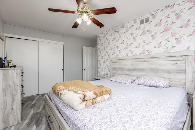 8821 N Washington St Unit F, Niles, IL 60714 - bedroom featuring a closet and ceiling fan
