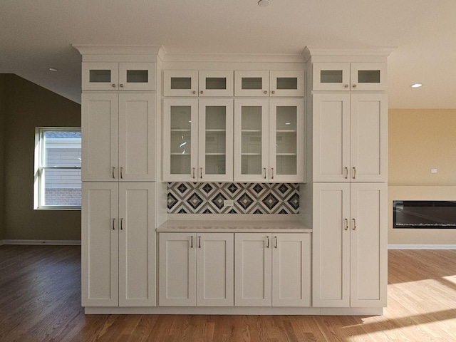 1221 Honey Lake Rd, Lake Zurich, IL 60047 - detailed view of wood finished floors, a glass covered fireplace, and recessed lighting
