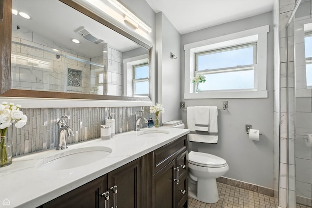 7515 W Roscoe St, Chicago, IL 60634 - full bathroom with double vanity, backsplash, a stall shower, and tile patterned floors