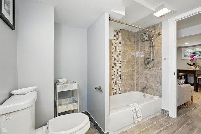 7515 W Roscoe St, Chicago, IL 60634 - full bath with shower / washtub combination and wood finish floors
