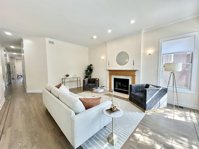 1617 N Hermitage Ave Unit 1S, Chicago, IL 60622 - living room with ornamental molding, wood finished floors, a fireplace with flush hearth, and recessed lighting