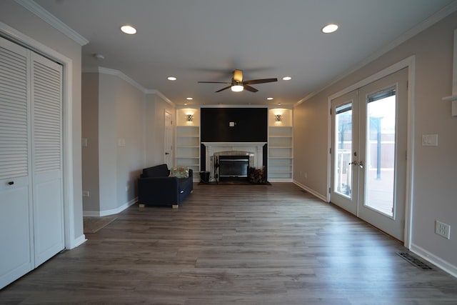 2304 Jay Ln, Rolling Meadows, IL 60008 - unfurnished living room with a ceiling fan, ornamental molding, french doors, a glass covered fireplace, and wood finished floors