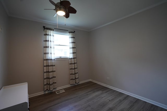 2304 Jay Ln, Rolling Meadows, IL 60008 - spare room with a ceiling fan, wood finished floors, and ornamental molding