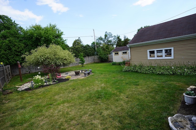 2304 Jay Ln, Rolling Meadows, IL 60008 - fenced backyard featuring a fire pit