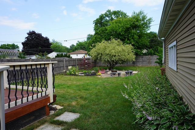 2304 Jay Ln, Rolling Meadows, IL 60008 - fenced backyard featuring an outdoor fire pit