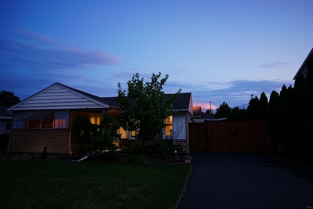 2304 Jay Ln, Rolling Meadows, IL 60008 - view of front of house featuring a gate, a yard, and asphalt driveway