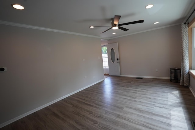 2304 Jay Ln, Rolling Meadows, IL 60008 - empty room with ceiling fan, recessed lighting, wood finished floors, and crown molding