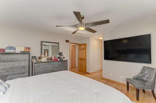807 Harris Ln Unit 807, Romeoville, IL 60446 - bedroom featuring wood finished floors and ceiling fan