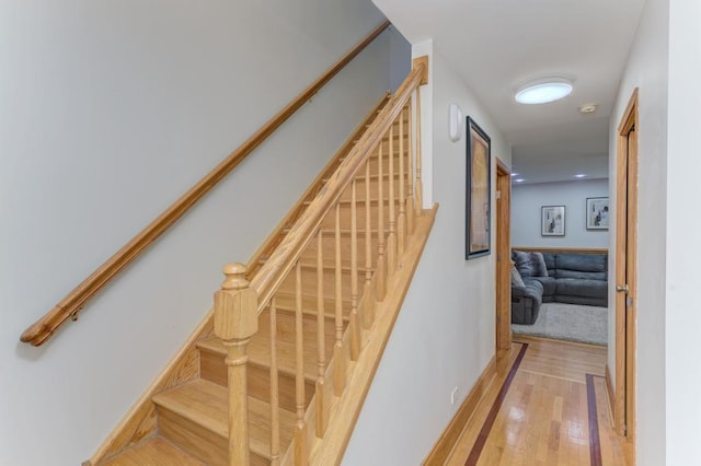 807 Harris Ln Unit 807, Romeoville, IL 60446 - stairway featuring wood finished floors and baseboards