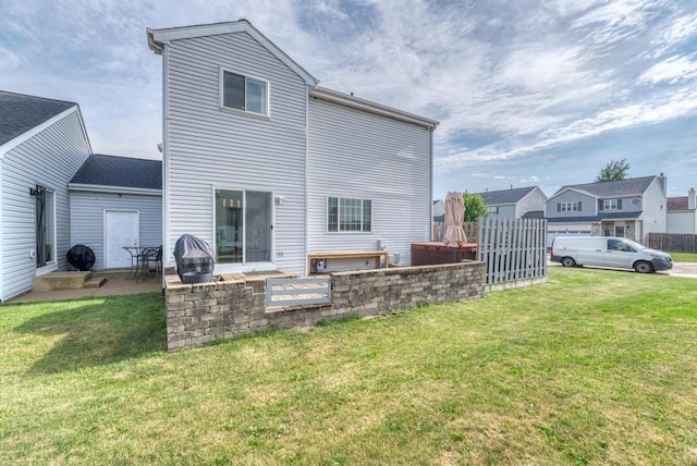 807 Harris Ln Unit 807, Romeoville, IL 60446 - back of property featuring a yard and a patio