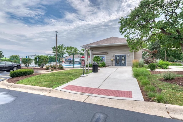 807 Harris Ln Unit 807, Romeoville, IL 60446 - view of front of property featuring a community pool