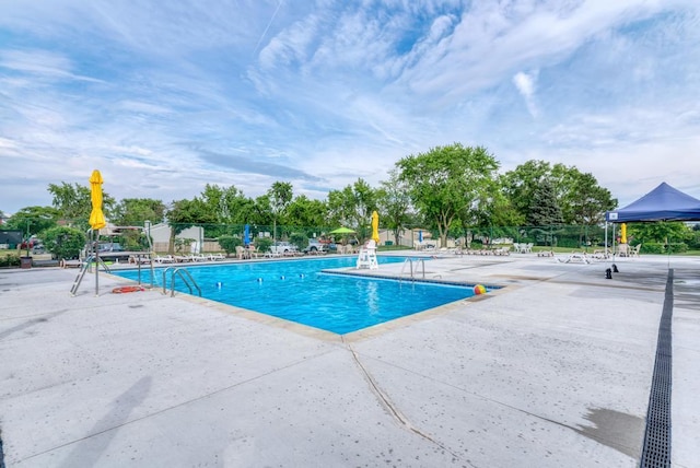 807 Harris Ln Unit 807, Romeoville, IL 60446 - community pool featuring a patio