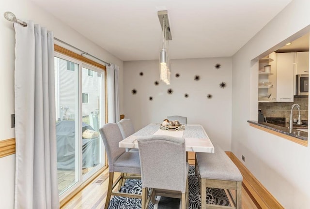 807 Harris Ln Unit 807, Romeoville, IL 60446 - dining area featuring light wood-type flooring