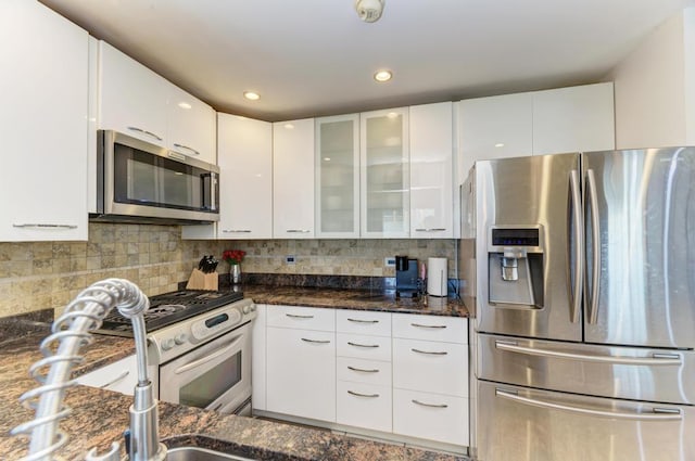 807 Harris Ln Unit 807, Romeoville, IL 60446 - kitchen featuring stainless steel appliances, white cabinets, glass insert cabinets, dark stone counters, and recessed lighting