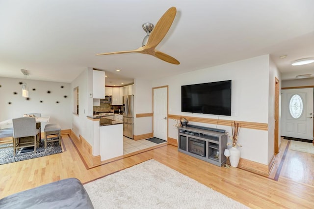 807 Harris Ln Unit 807, Romeoville, IL 60446 - living area with light wood-style flooring, ceiling fan, and recessed lighting