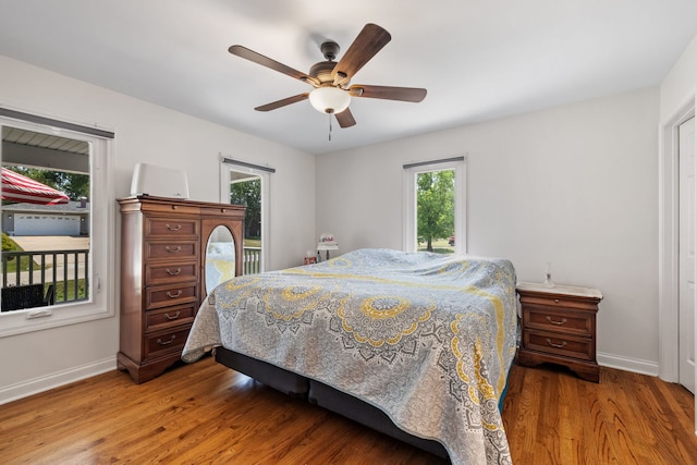 12351 W Warren Dr, Mokena, IL 60448 - bedroom with wood finished floors and ceiling fan