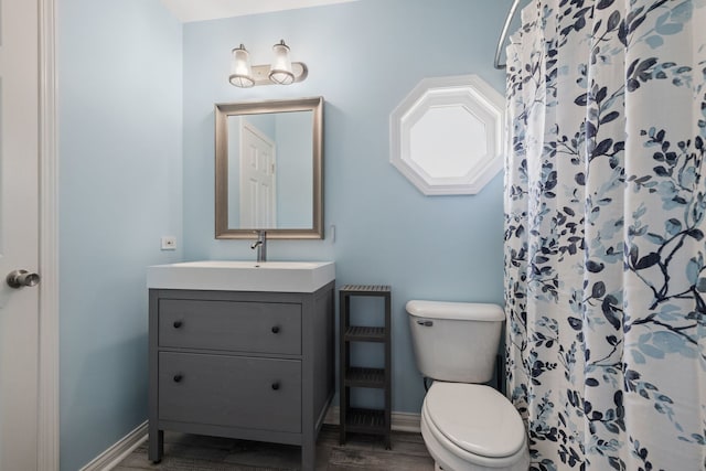 12351 W Warren Dr, Mokena, IL 60448 - bathroom featuring vanity, wood finished floors, and a shower with shower curtain