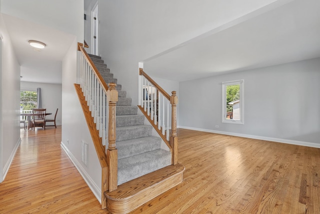 12351 W Warren Dr, Mokena, IL 60448 - staircase with wood finished floors and baseboards