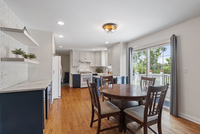 12351 W Warren Dr, Mokena, IL 60448 - dining space with light wood finished floors and recessed lighting