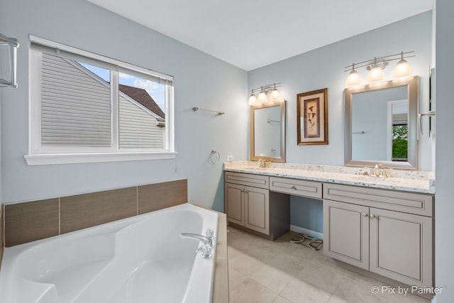 534 Ivory Ln, Bartlett, IL 60103 - bathroom with double vanity, a bath, and tile patterned flooring