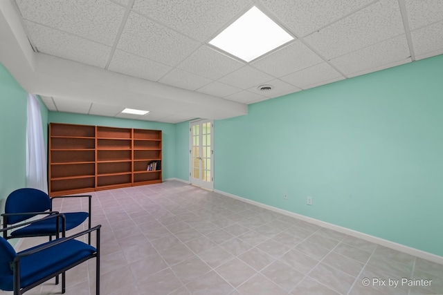 534 Ivory Ln, Bartlett, IL 60103 - unfurnished room featuring a drop ceiling, tile patterned floors, and built in features